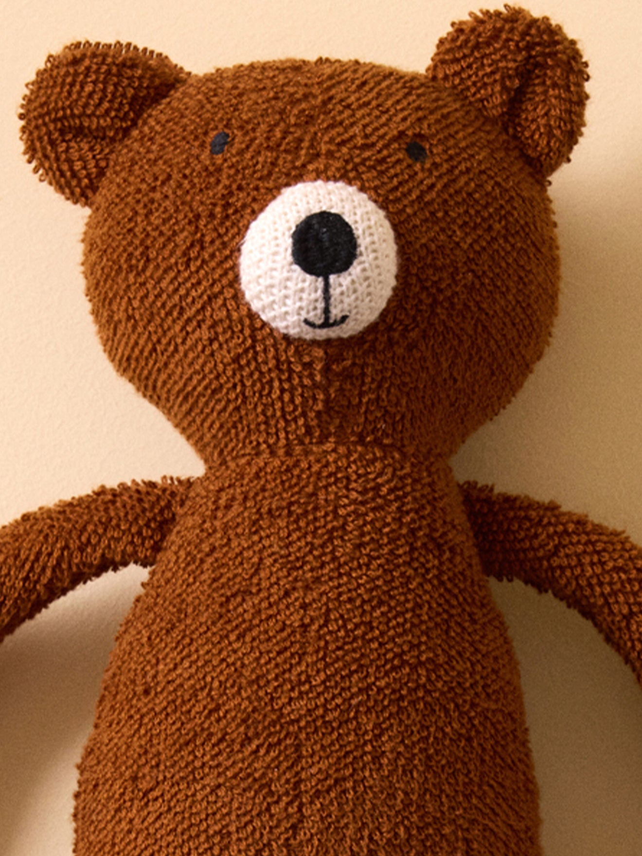 Peluche ours en bouclette