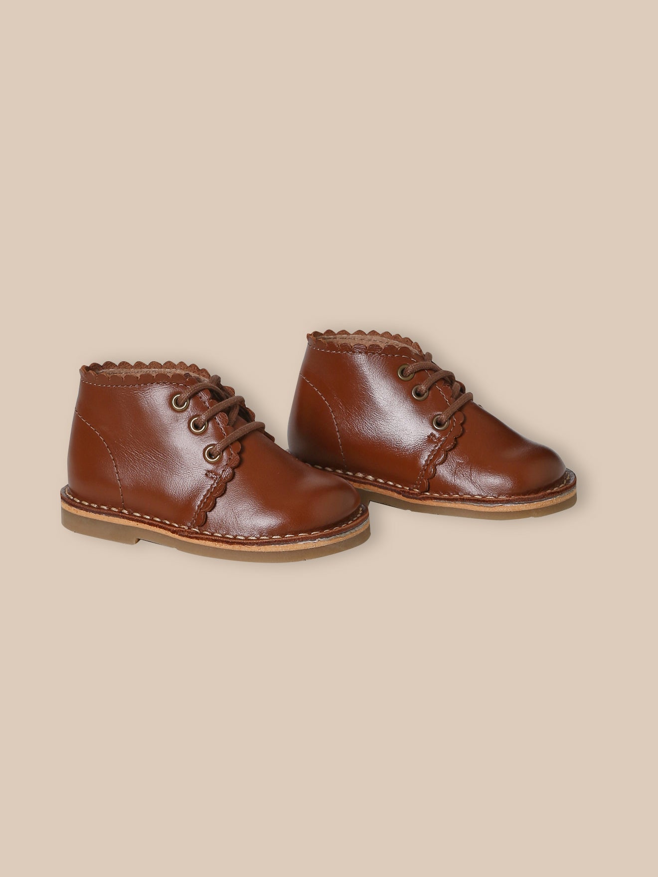 Bottines festonnées en cuir bébé